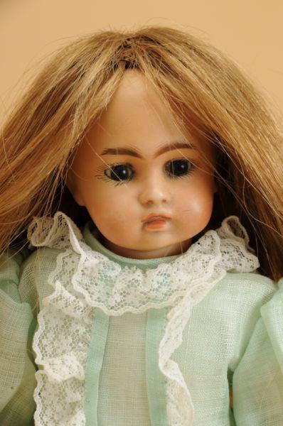 Appraisal: Sonnerg Belton-Type Child Doll Germany ca light brown bisque socket