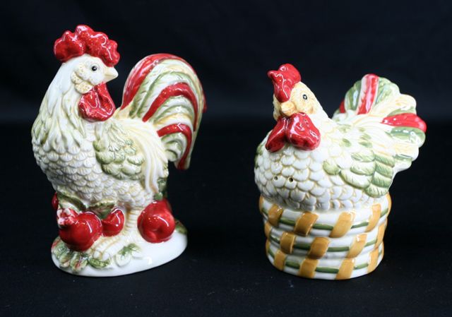 Appraisal: A pair of Royal Doulton Chanticlar salt and pepper shakers