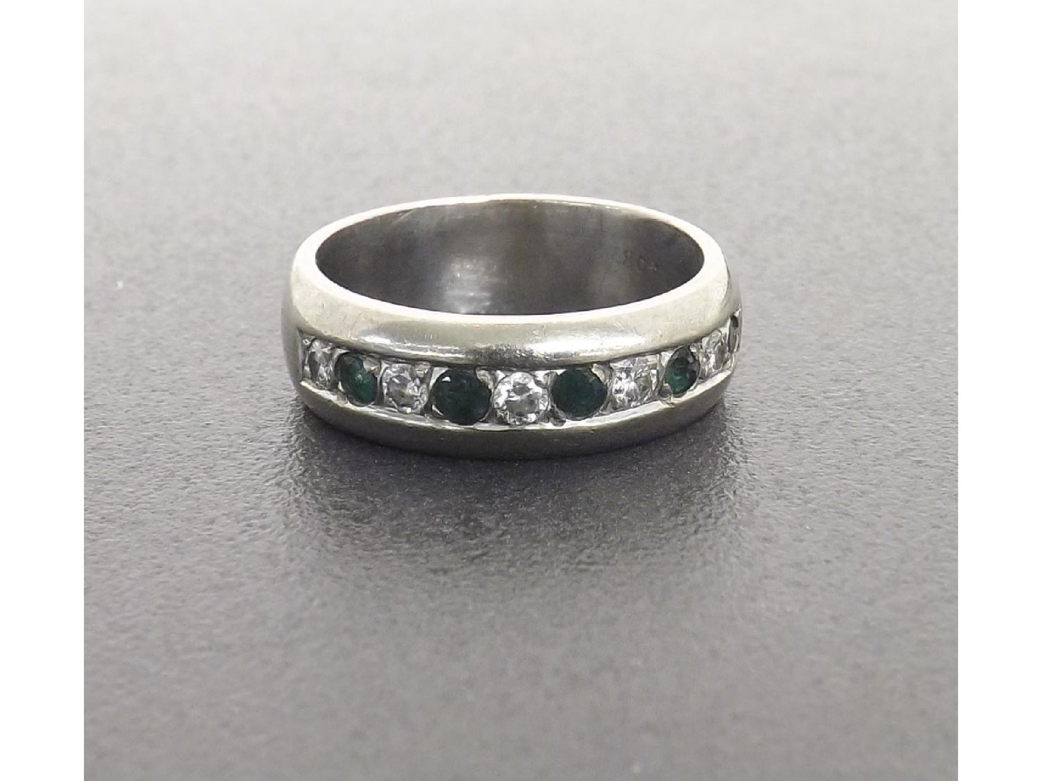 Appraisal: ct white gold emerald and diamond band ring band width