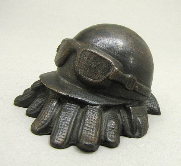 Appraisal: A decorative 'Racing gear' bronze paperweight by Tiercel Art Foundry