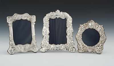 Appraisal: Three Sterling Silver Picture Frames with Stands The first with