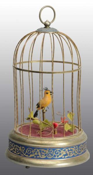 Appraisal: Bird in Cage Wind-Up Toy Description European Working When wound