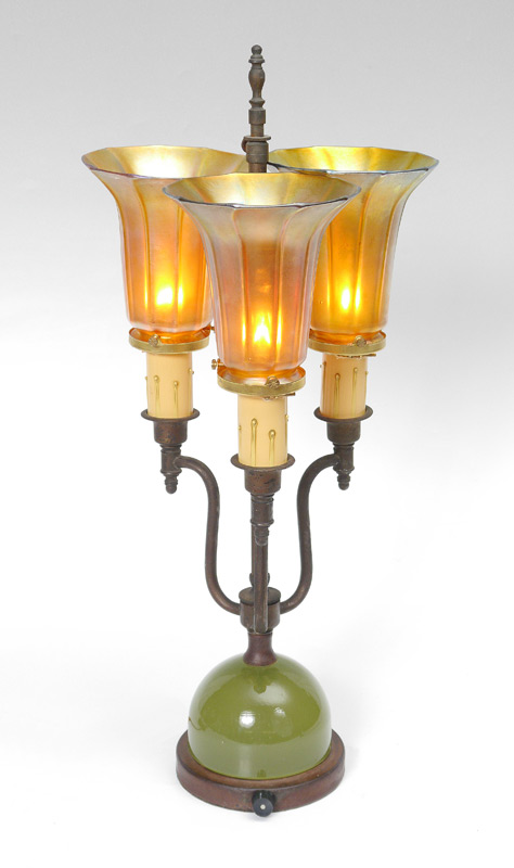 Appraisal: LIGHT PARLOR LAMP WITH QUEZAL SHADES Table lamp with rounded