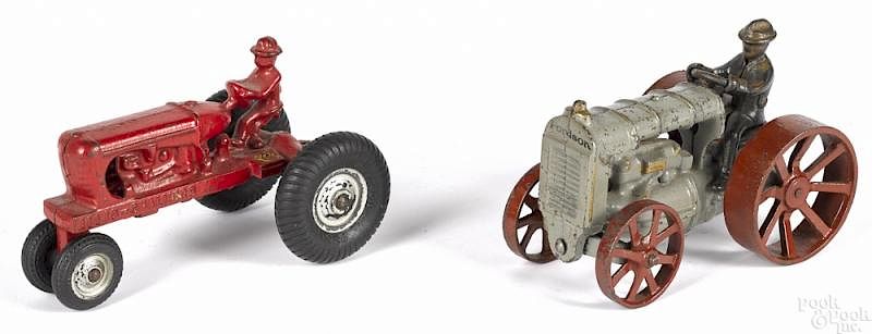 Appraisal: Two Arcade cast iron tractors Two Arcade cast iron tractors