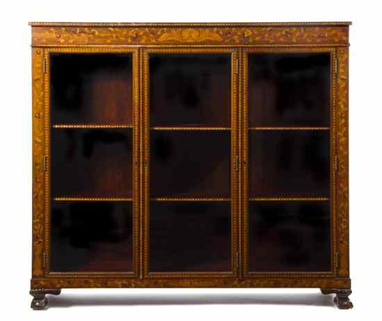 Appraisal: A Continental Marquetry Bibliotheque of rectangular form with three glazed