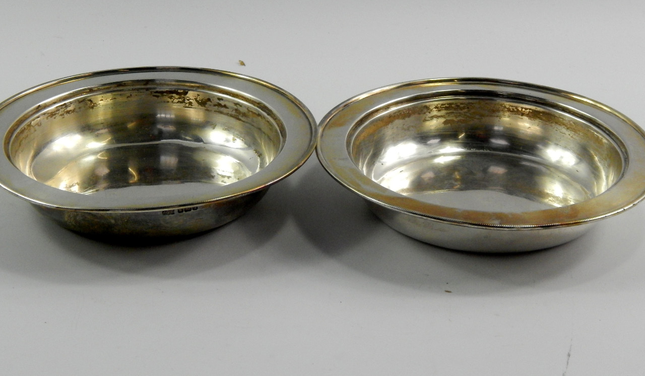 Appraisal: A pair of George V silver dishes for Harrods London