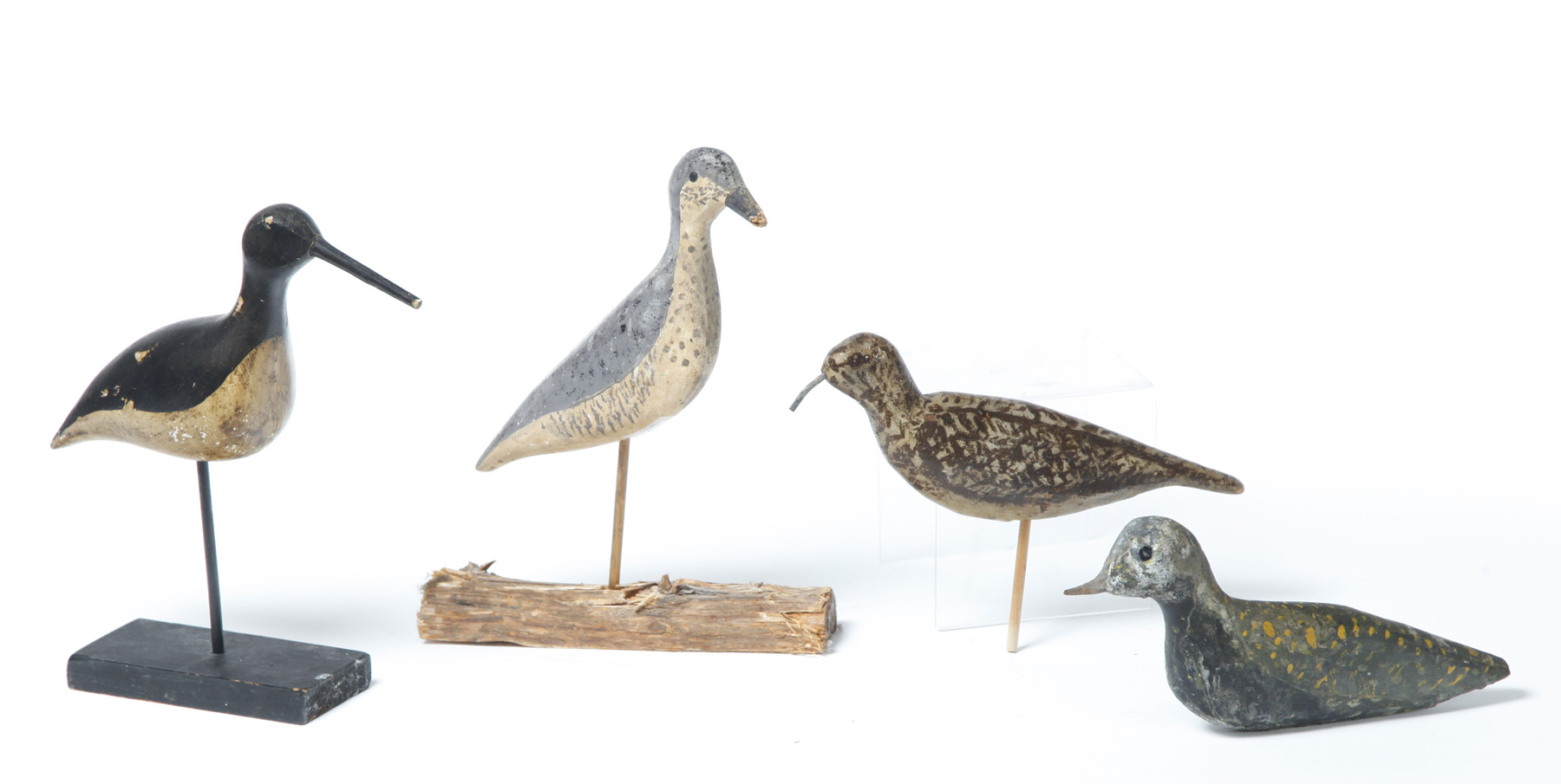 Appraisal: FOUR SHOREBIRD DECOYS American th century New Jersey plover l