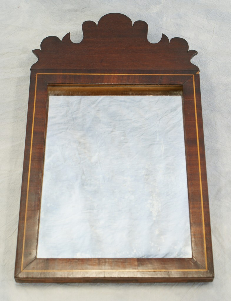 Appraisal: String inlaid mahogany Chippendale style wall mirror late th or