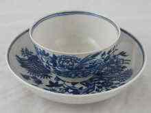 Appraisal: A blue and white fence pattern Worcester teabowl and saucer