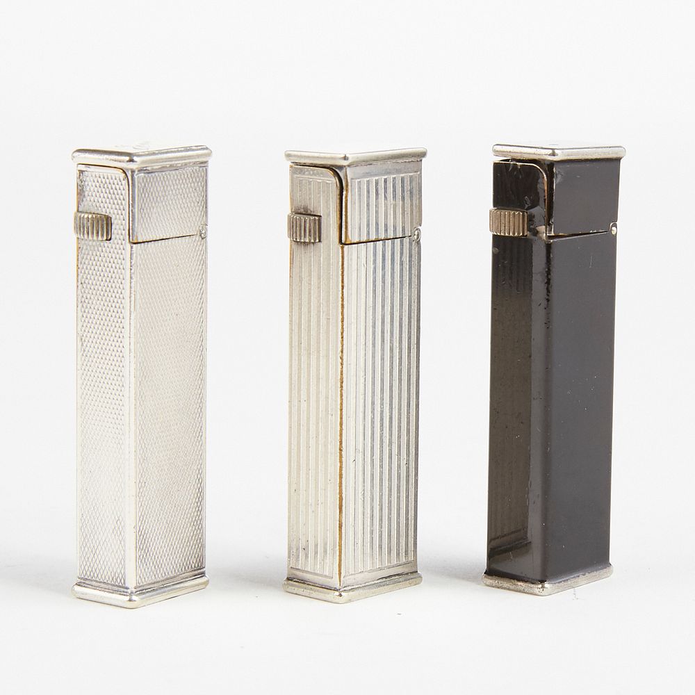 Appraisal: Grp Dunhill Cartier Licensed Tallboy Lighters Dunhill United Kingdom Three