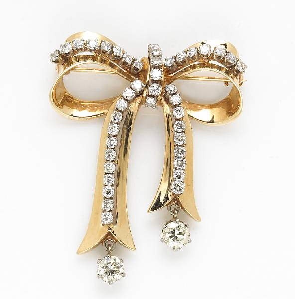 Appraisal: A diamond and fourteen karat gold bow brooch-pendant estimated total