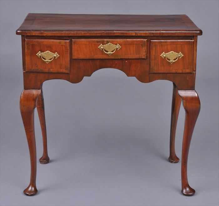 Appraisal: QUEEN ANNE INLAID WALNUT DRESSING TABLE The cross-banded top with