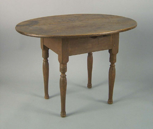 Appraisal: New England pine tavern table ca with an oval top