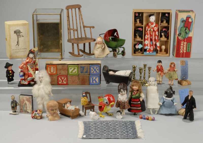 Appraisal: Large Lot of Miscellaneous Dolls and Toys Description Oriental Geisha