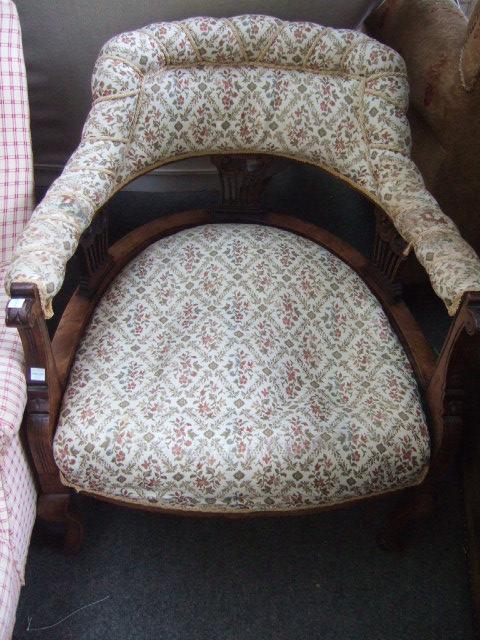 Appraisal: A pair of late th century mahogany framed tub chairs