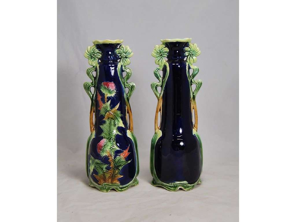 Appraisal: A pair of Art Nouveau majolica vases decorated with thistles