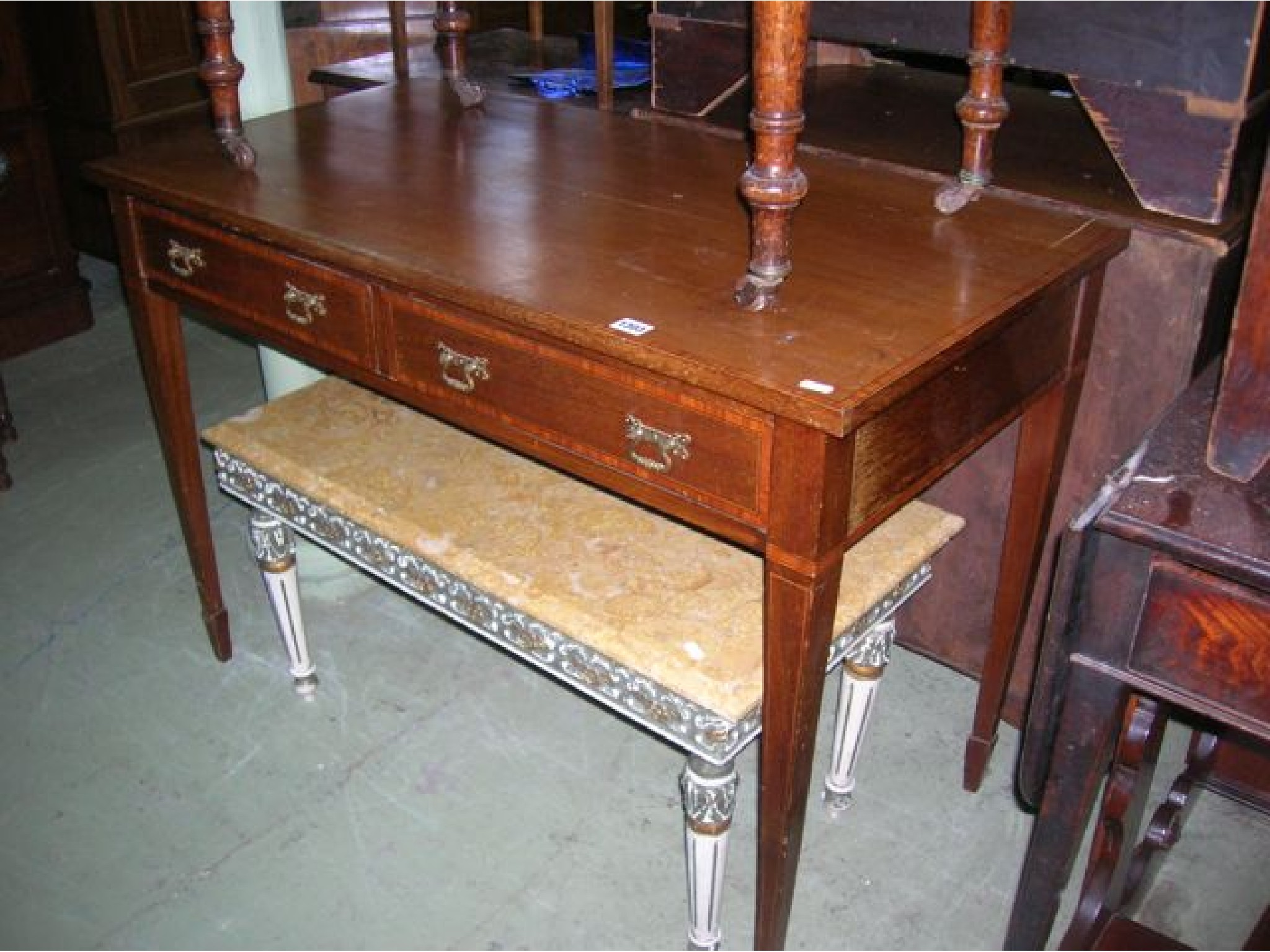 Appraisal: An inlaid Edwardian mahogany side table with satin wood banded