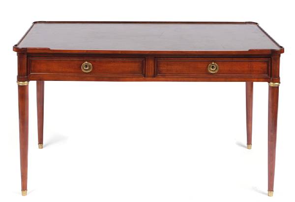 Appraisal: A Louis XVI style brass mounted mahogany writing table late