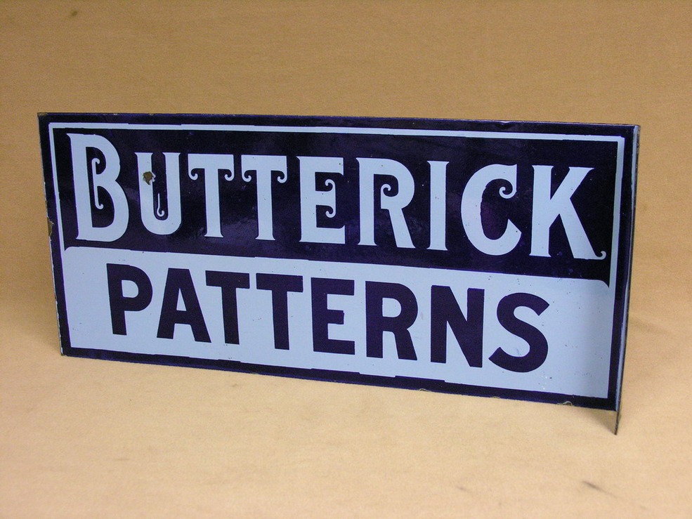 Appraisal: BUTTERICK PATTERNS DOUBLE PORCELAIN FLANGE SIGN Size by with a