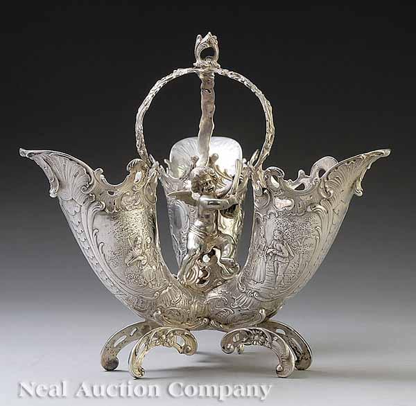 Appraisal: A German Silver Repouss Vase comprised of three cornucopiae centered