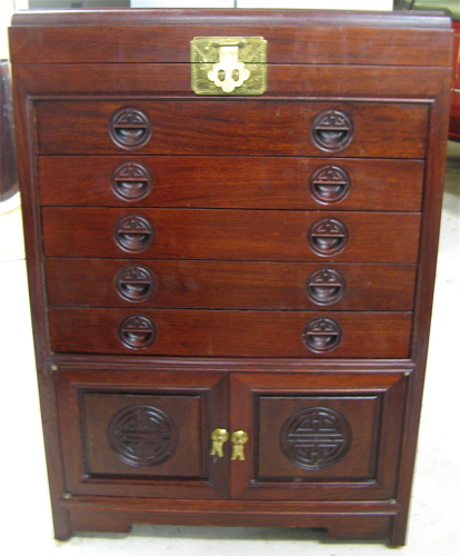 Appraisal: CHINESE ROSEWOOD SILVERWARE CHEST WITH CONTENTS The chest has a