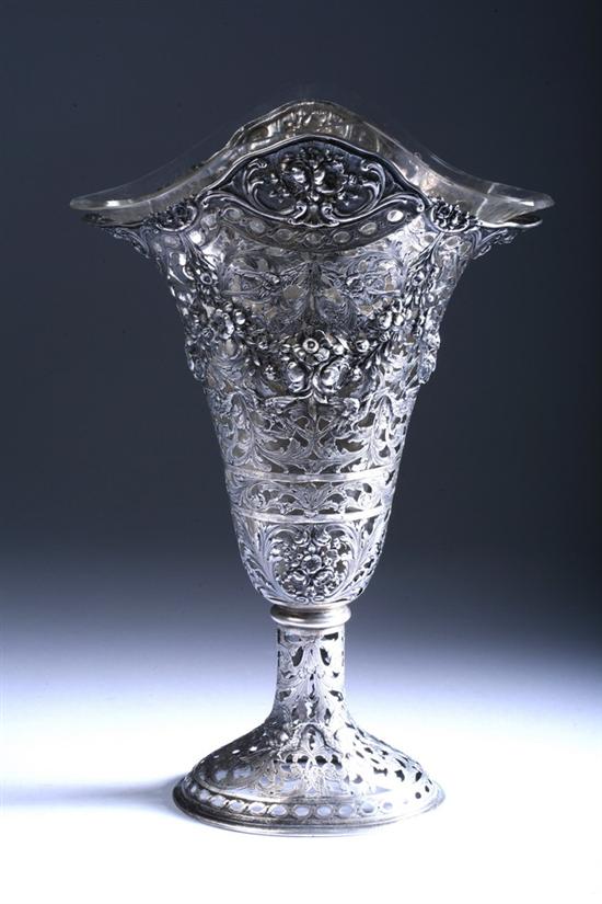 Appraisal: GERMAN SILVER REPOUSS OPENWORK VASE late th century touchmark Pedestal