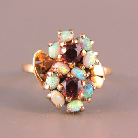 Appraisal: Garnet Opal Ring rich garnets surrounded by fiery opals in