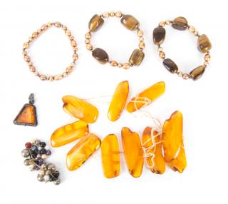 Appraisal: Two tiger's eye stretch bracelets along with freshwater pearl bracelet