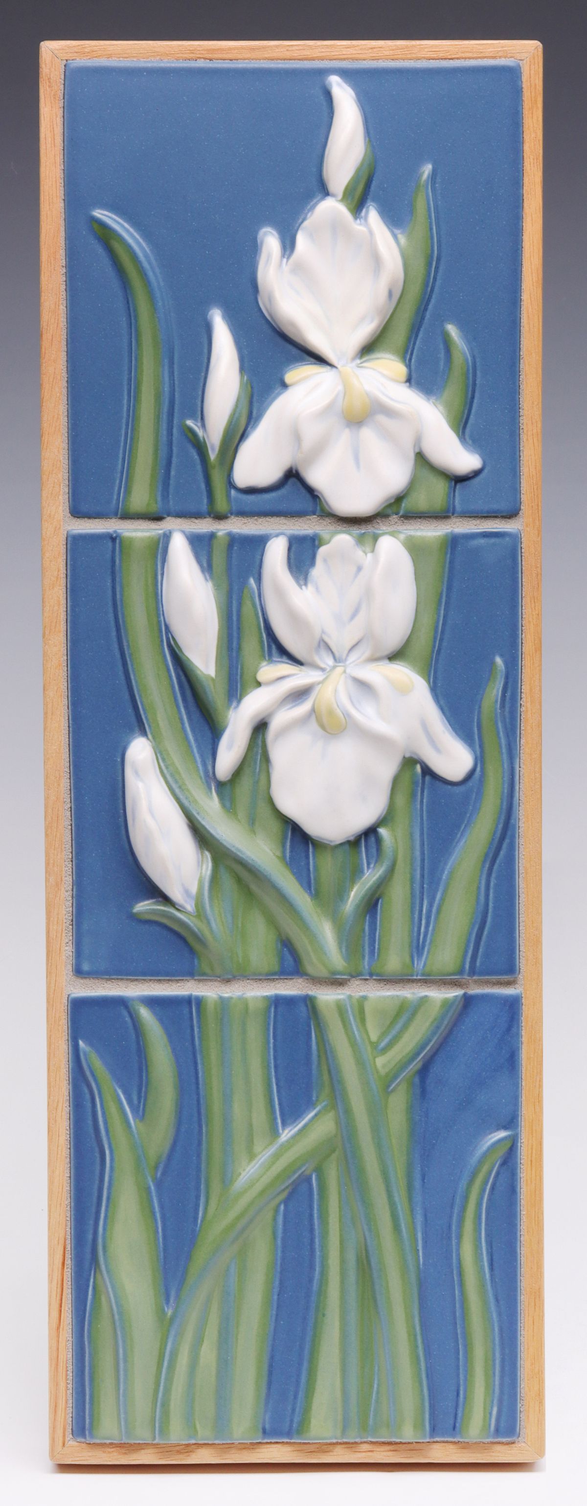 Appraisal: A CONTEMPORARY ROOKWOOD IRIS ART POTTERY TILE SETThe three piece