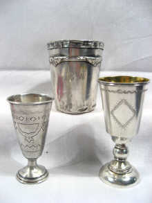 Appraisal: Two Russian hallmarked silver vodka cups together with a Spanish