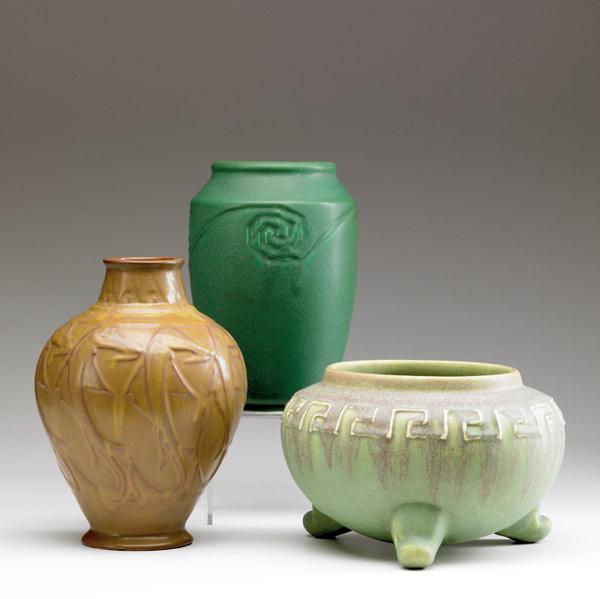 Appraisal: ROOKWOOD Three Production vases a three-footed jardiniere with Greek Key