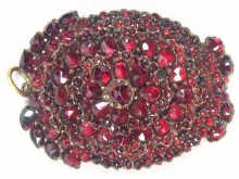 Appraisal: An antique white metal Bohemian garnet brooch pendant