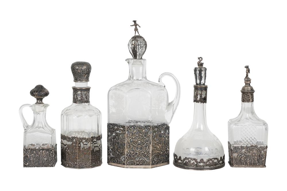 Appraisal: FIVE SILVER ETCHED GLASS BOTTLESwith lids Condition with tarnish residue