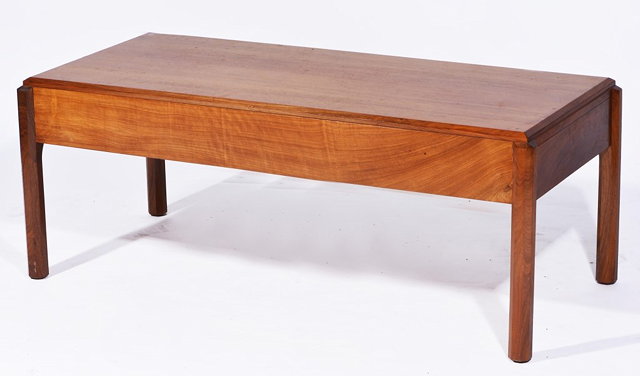 Appraisal: A REYNOLDS OF LUDLOW WALNUT RECTANGULAR COFFEE TABLE on octagonal