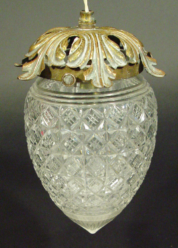 Appraisal: Cut glass acorn shaped ceiling light shade with brass leaf