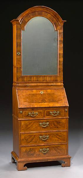 Appraisal: A diminutive George I style figured walnut secretary cabinet circa