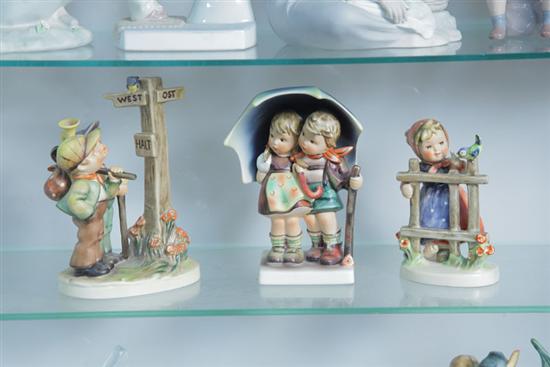 Appraisal: THREE HUMMEL FIGURINES ''Crossroads'' '' h ''Stormy Weather'' I ''