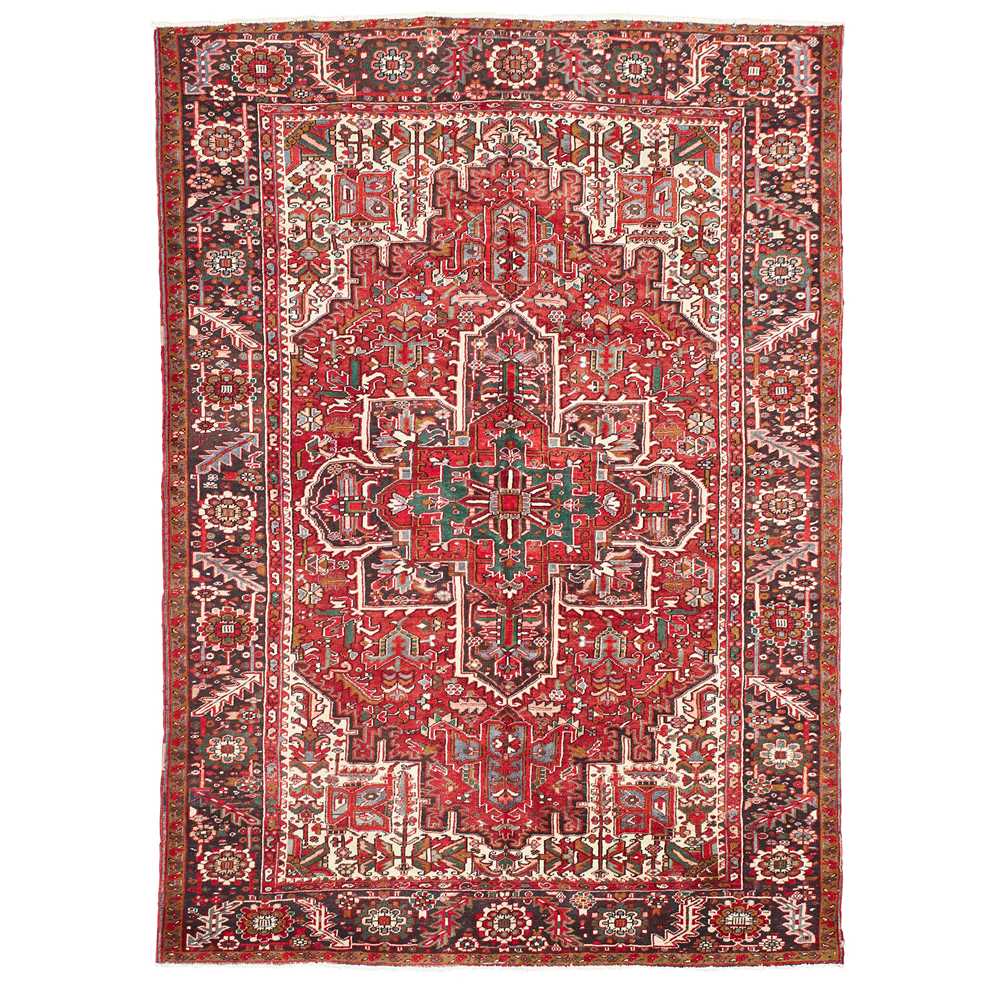 Appraisal: HERIZ CARPET NORTHWEST PERSIA LATE TH CENTURY the red field