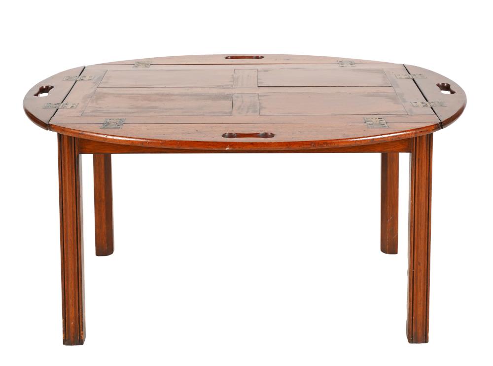 Appraisal: BUTLER'S STYLE WOODEN COFFEE TABLE th century unsigned the top