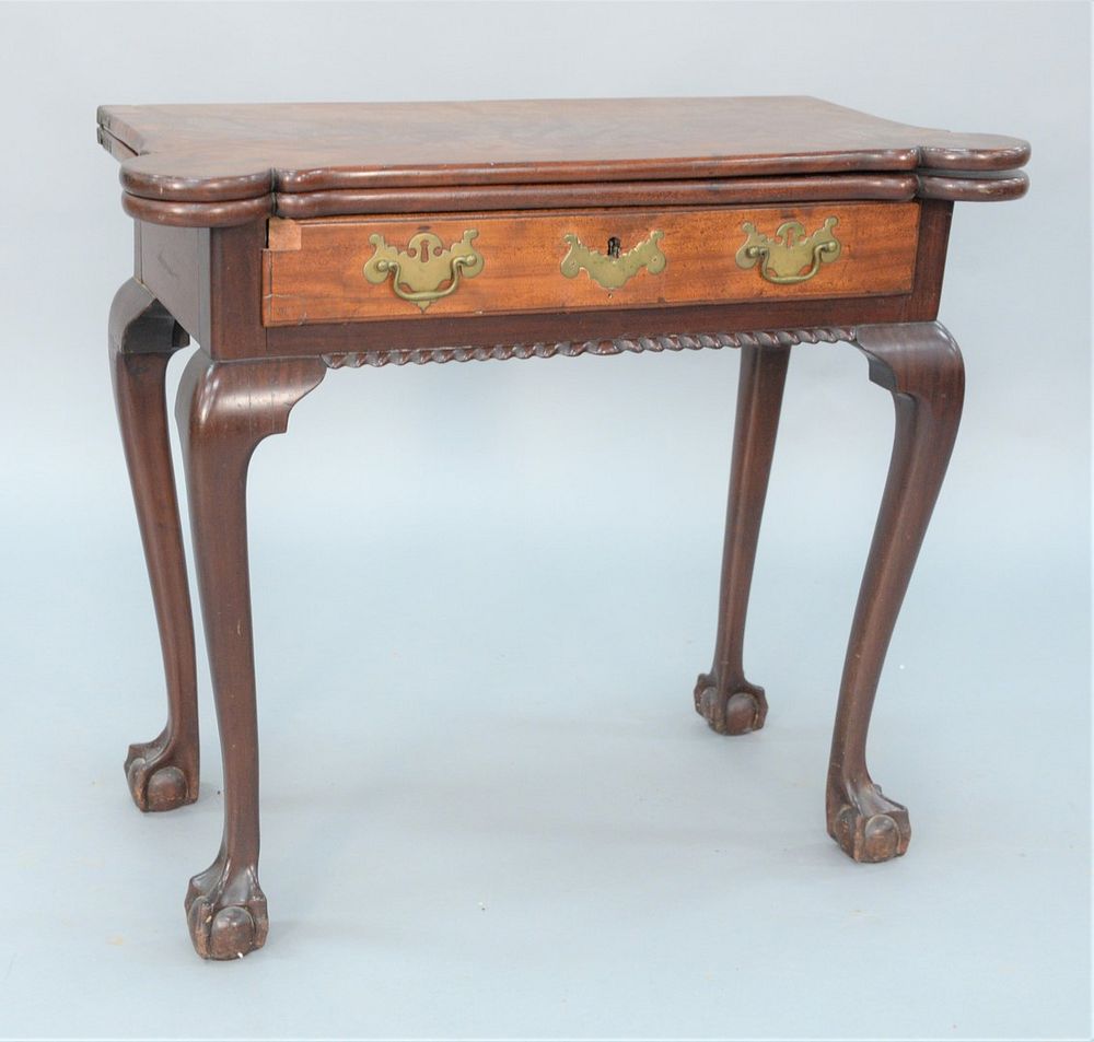 Appraisal: Diminutive Chippendale Mahogany Games Table having shaped top with rounded