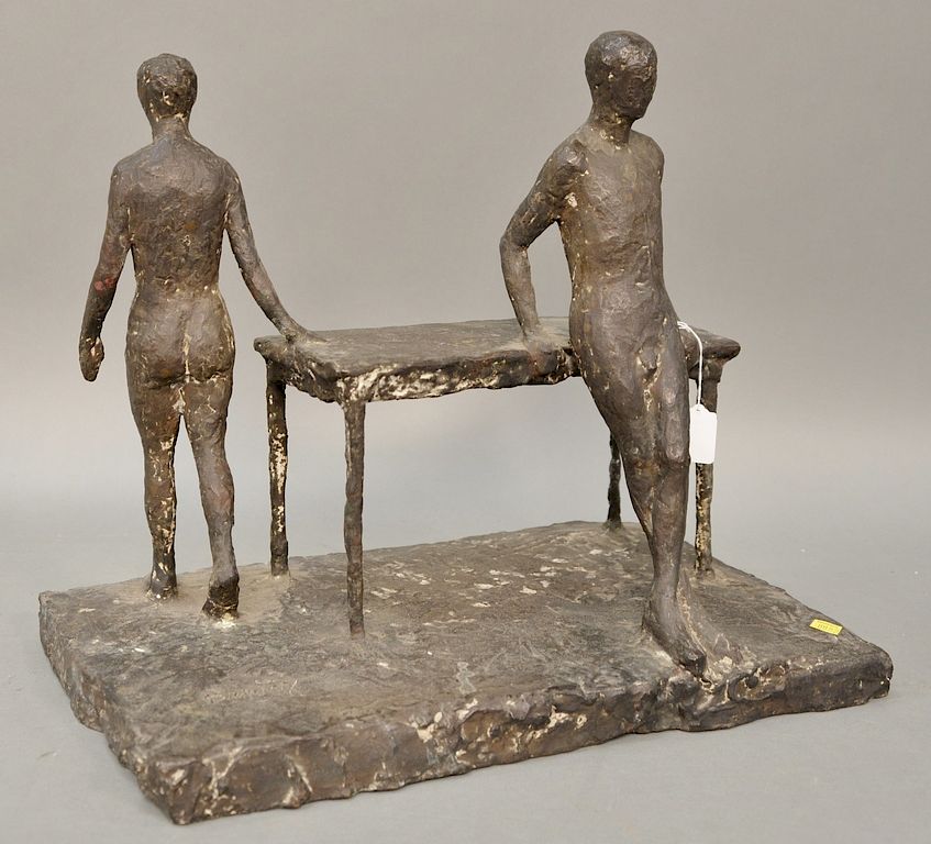 Appraisal: Figural bronze sculpture having two figures and a table ht