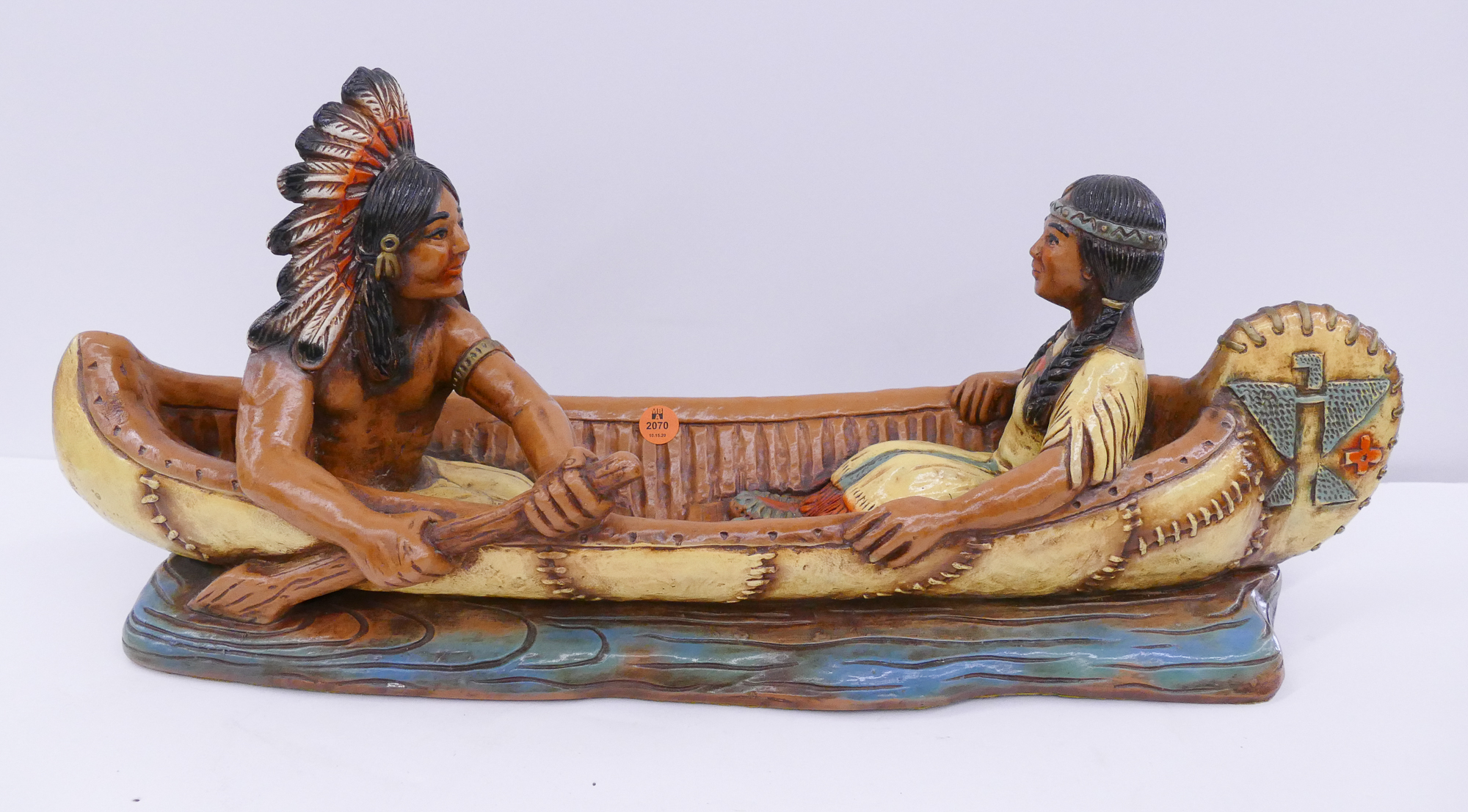 Appraisal: Chalkware Indians in Canoe Figure- ''