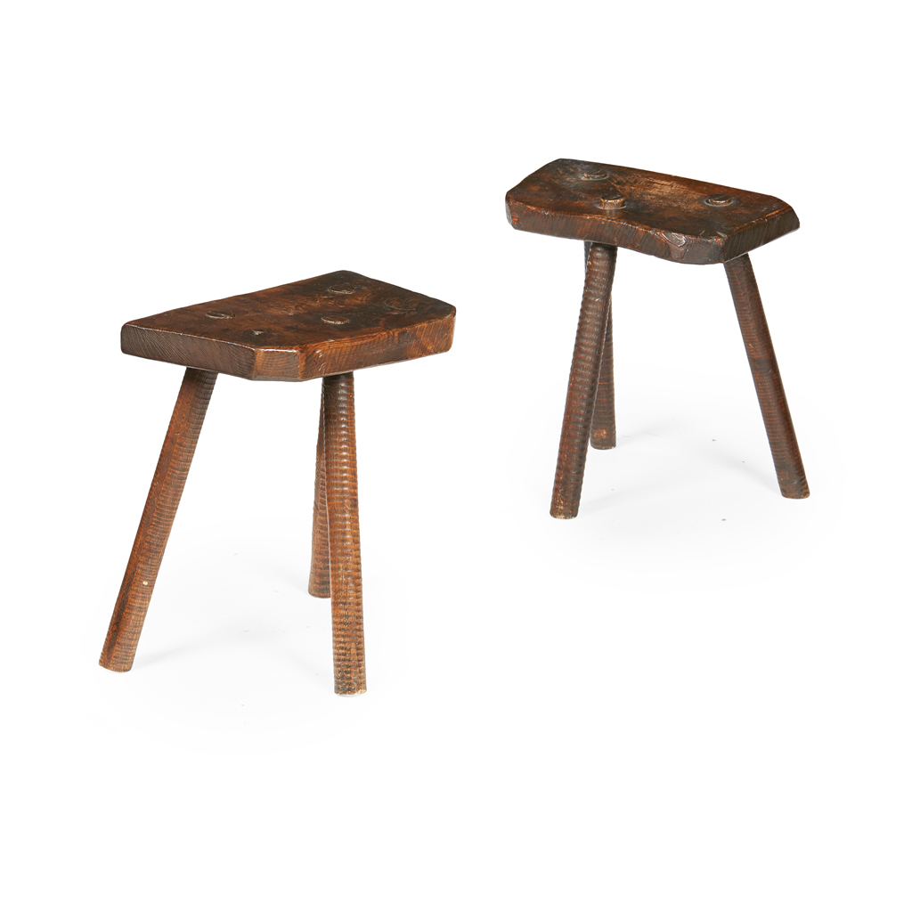 Appraisal: NEAR PAIR OF ELM THREE LEGGED STOOLS TH CENTURY the