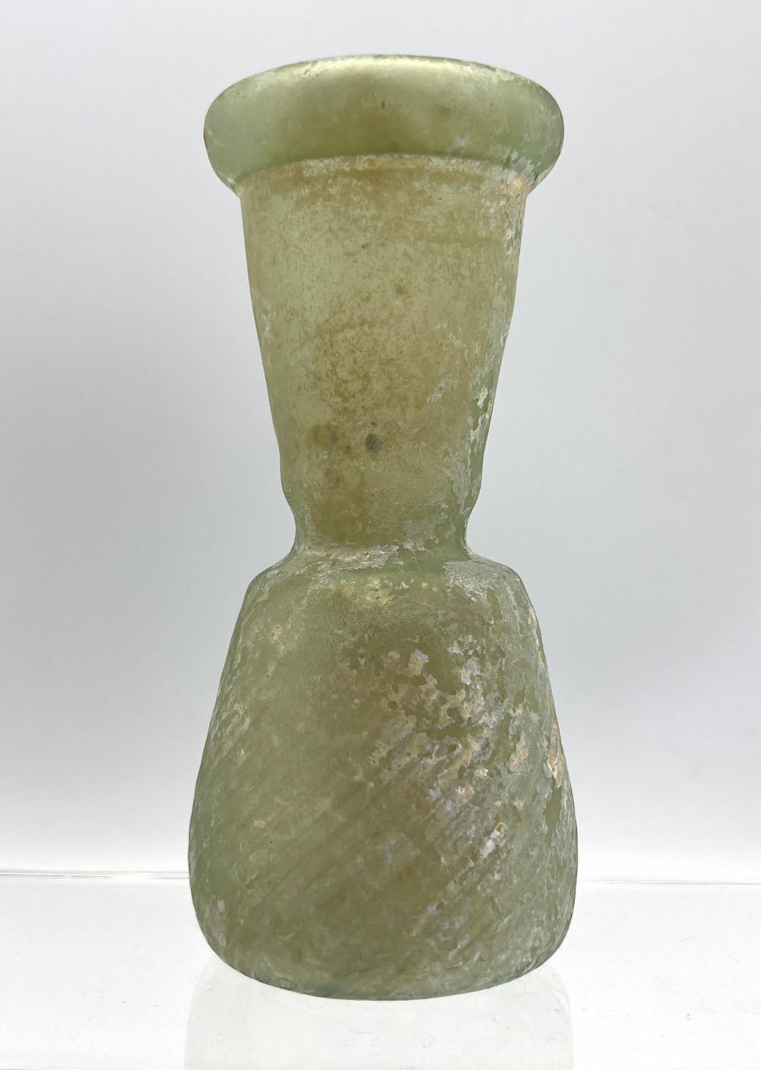 Appraisal: Pale green vessel Ancient Roman glass with ribbed body Dimensions