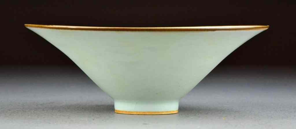 Appraisal: Chinese Qing Celedon Porcelain BowlThe interior finely incised with dragon