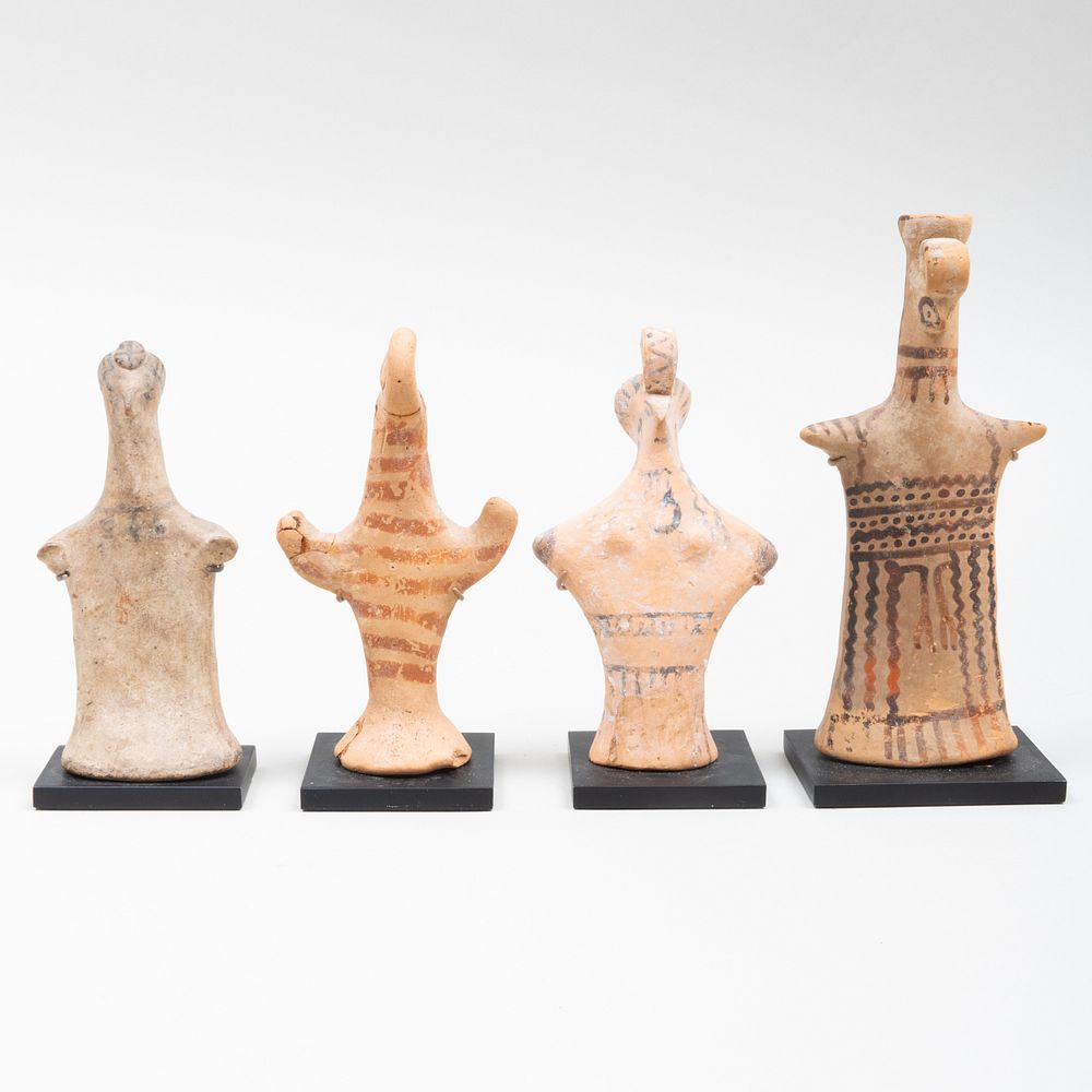 Appraisal: Group of Four Boeotian Terracotta Votive Figures The largest x