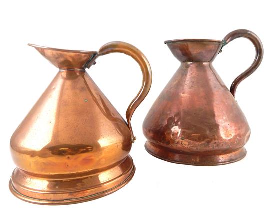 Appraisal: Two th C English copper pitchers gallon and half-gallon both