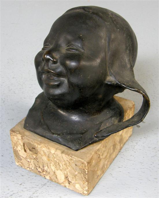 Appraisal: Twentieth century cast bronze head of a Dutch girl on