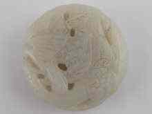 Appraisal: A Chinese white jade circular pendant carved and pierced cm