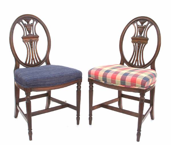 Appraisal: A set of eight Neoclassical style dining chairs comprising one